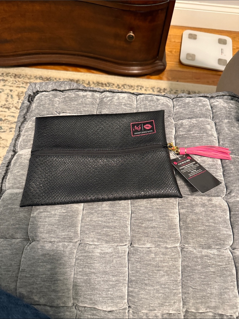 Makeup Junkie Black Cosmetic Bag with Pink Tassel